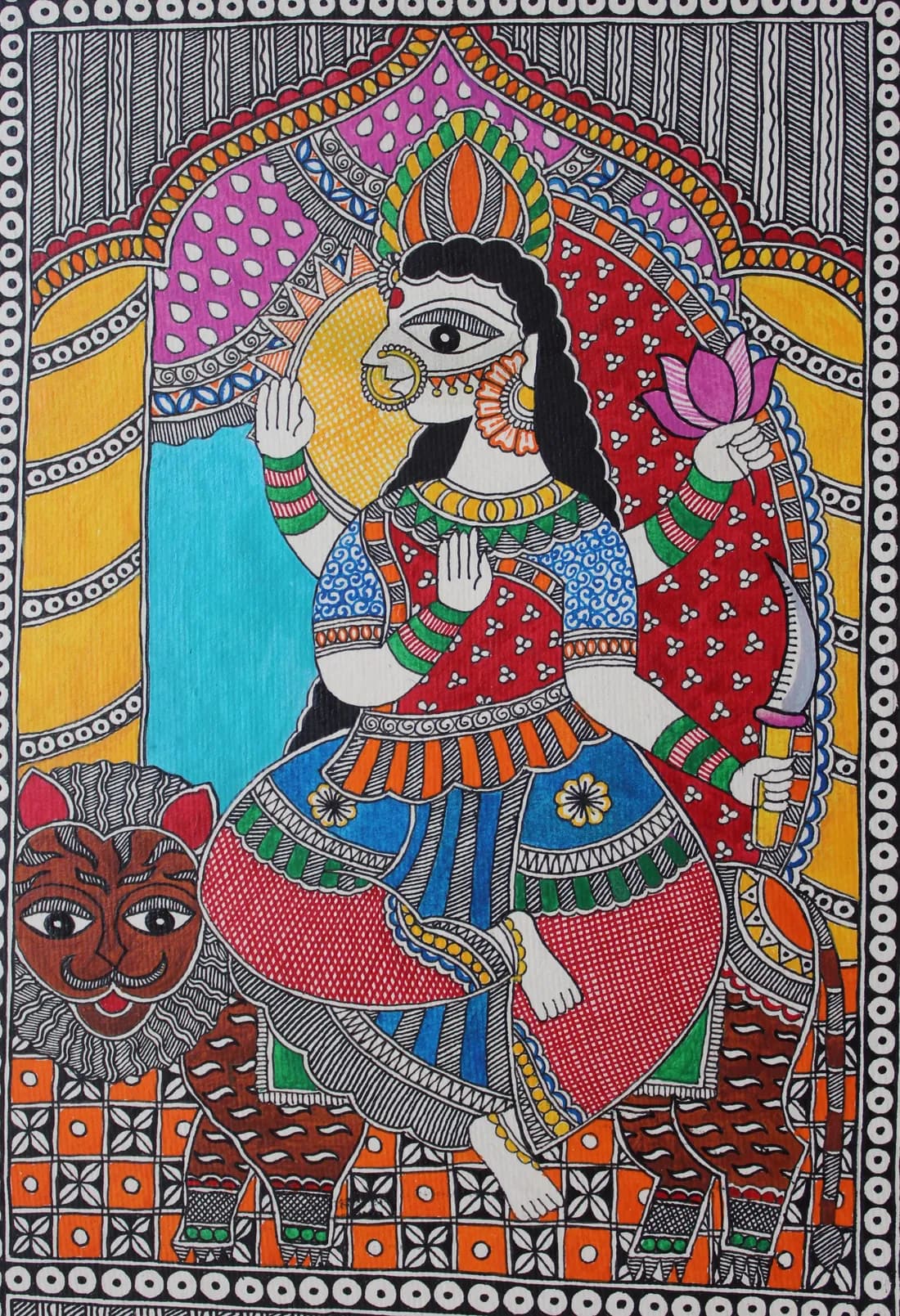 Madhubani painting of a goddess with a raised blessing hand holding a lotus and sword, seated on her animal vahana beneath golden pillars